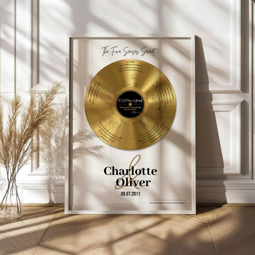 Personalized wedding gift — Five Senses gold vinyl record on white background, framed in white wood with custom marriage vows.