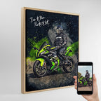Custom Ninja motorcycle watercolour canvas portrait in natural wood frame — personalised biker wall art shown next to original reference photo on smartphone.