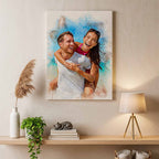 Personalized beach vacation portrait by Ausome Love Studio with a watercolor effect printed on wall art, featuring a couple laughing on a piggyback ride, displayed in a modern home interior.