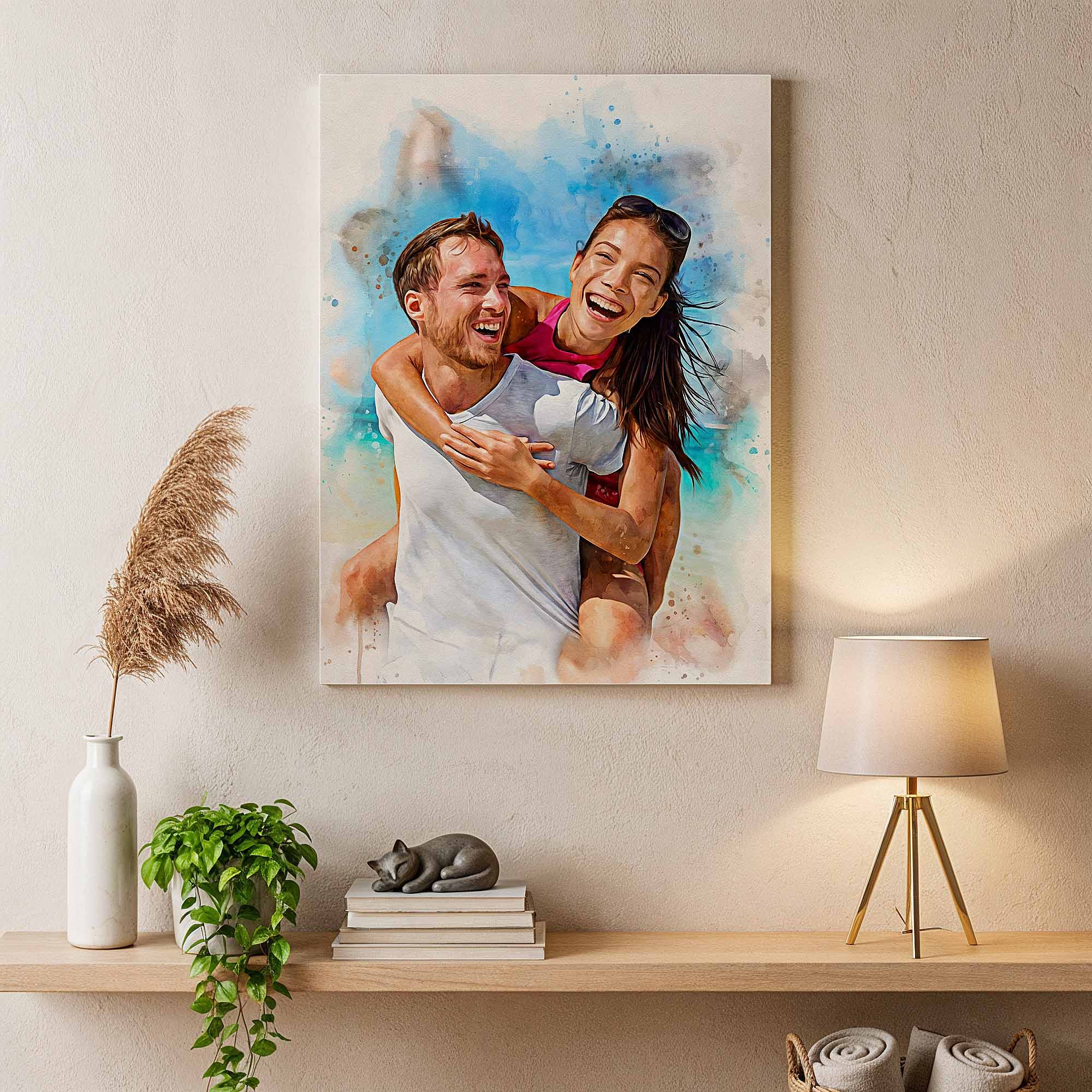 Personalized beach vacation portrait by Ausome Love Studio with a watercolor effect printed on wall art, featuring a couple laughing on a piggyback ride, displayed in a modern home interior.