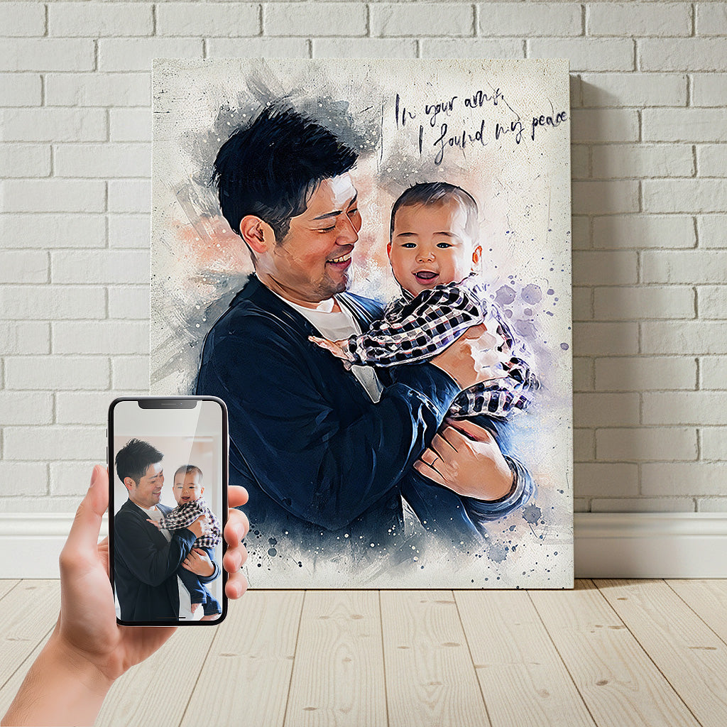 A heartwarming father and baby portrait transformed into a watercolor masterpiece by Ausome Love Studio, featuring custom script and an artistic splatter effect displayed alongside the original reference photo.