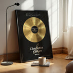 Personalized couples gift — Five Senses gold vinyl record on black background, framed in black wood with custom names.