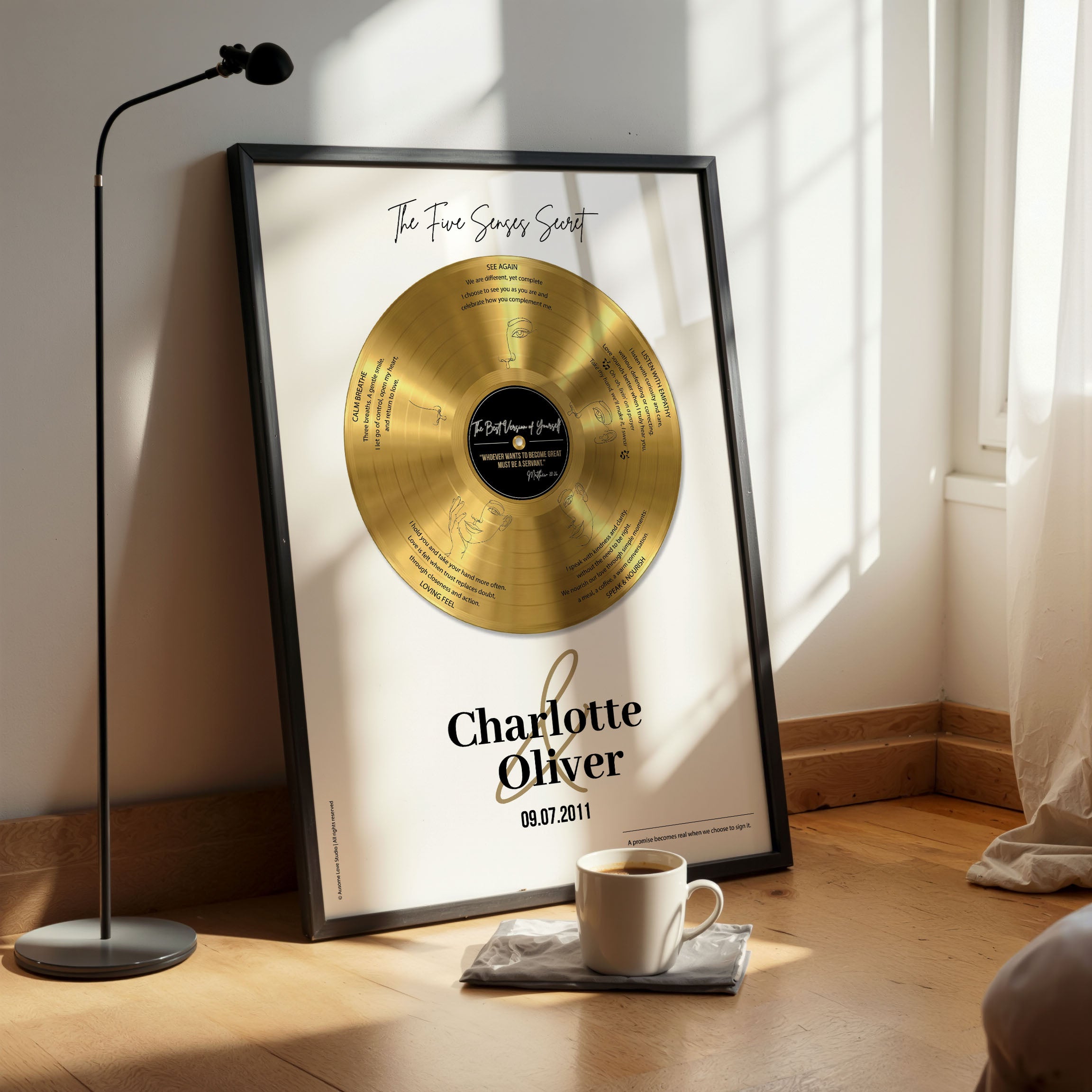 Personalized anniversary gift — Five Senses gold vinyl record on white background, framed in black wood with custom names.