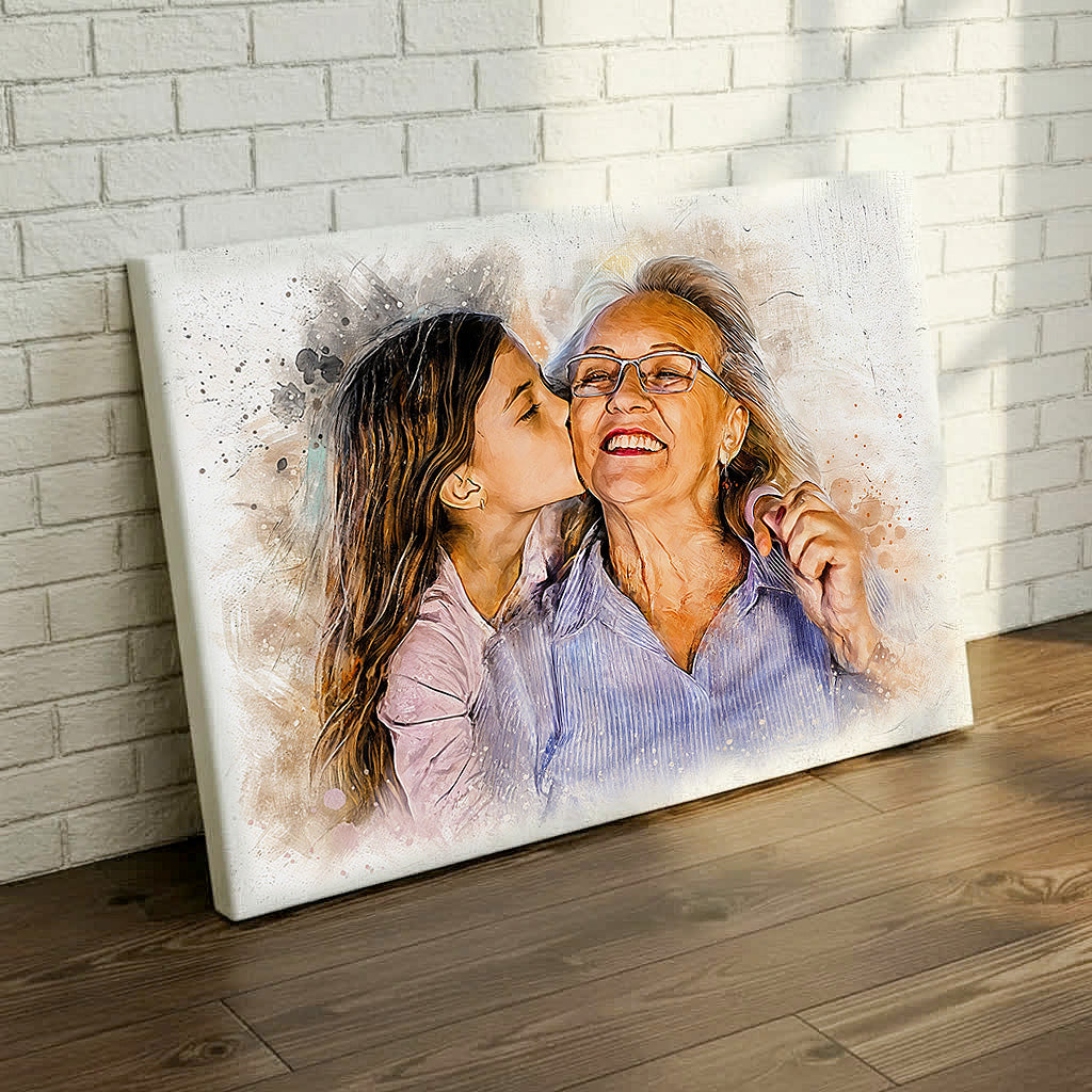 Heartwarming watercolor portrait of a granddaughter kissing her grandmother, displayed as a large gallery-wrapped canvas leaning against a white brick wall by Ausome Love Studio.